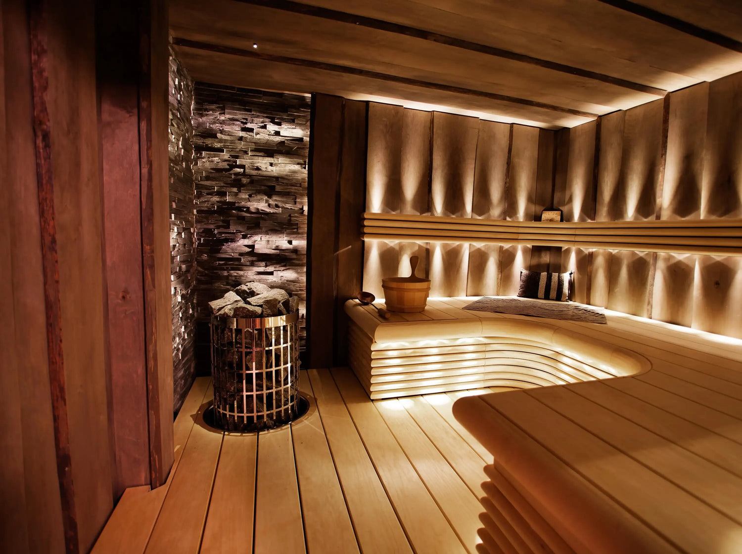 beautiful indoor suana with wood burning sauna heater
