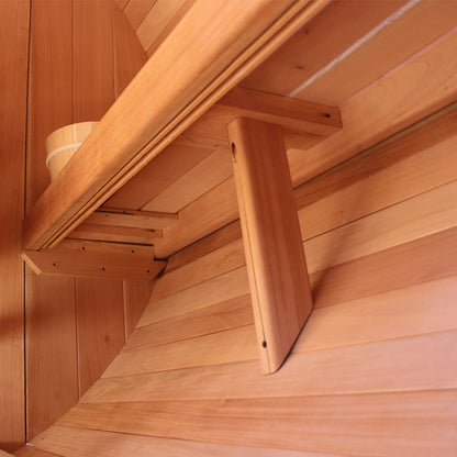 Cedar benches inside a barrel sauna
