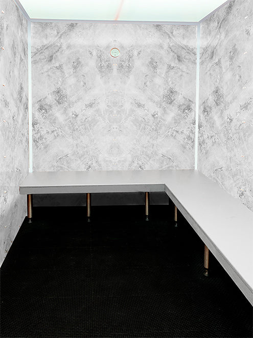 Scandia home steam room with stone-texture wall print